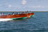 Three wooden speedboats
